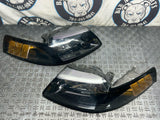 1999-04 Ford Mustang OEM Head Light Pair 285