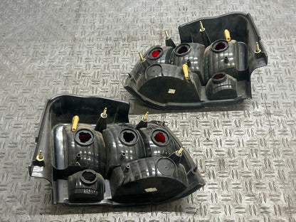 2003-04 Ford Mustang SVT Cobra OEM Tail Light Housings Pair 295