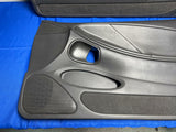 1999-04 Ford Mustang Coupe Dark Charcoal Door Panels Minor Damage 151